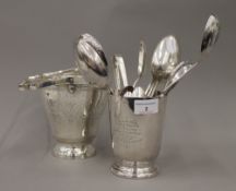 A small quantity of silver plate, to include an ice bucket, nips, flatware, etc.