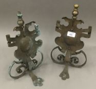 A pair of brass Arts and Crafts table lamps,