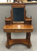 A Victorian walnut mirror back dressing table