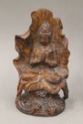 A wooden figure of Guanyin