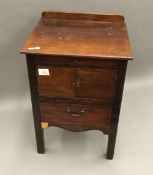 A 19th century mahogany bedside commode cupboard,