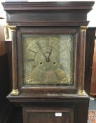 An early 18th century oak cased longcase clock,