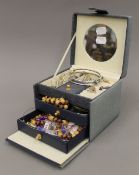 A box of silver and costume jewellery