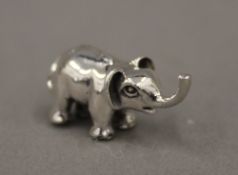 A miniature silver model of an elephant