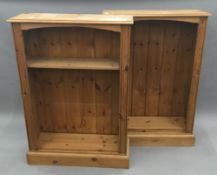 A pair of modern pine bookcases