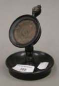 A Victorian turned ebony pocket watch stand