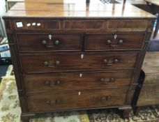 A large 19th century mahogany North Country chest of two short over three long drawers
