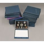 Twenty two Royal Mint United Kingdom proof coin collections comprising 1980-1999 with duplicates