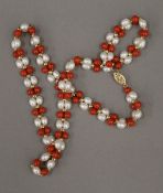 A 14 ct yellow gold pearl and coral set necklace,