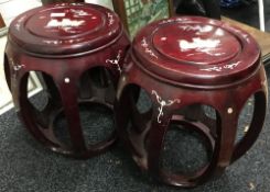 A pair of Chinese mother-of-pearl inlaid wooden garden seats