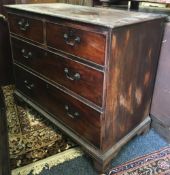 A George III mahogany chest of two short over two long drawers,