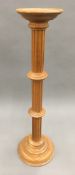 A turned and fluted oak column