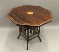 A Victorian inlaid rosewood octagonal centre table,