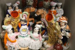 A collection of 19th century Staffordshire figural groups and a small quantity of decorative china