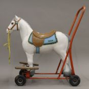 A Tri-Ang child's ride on horse