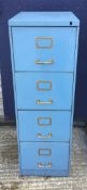 A vintage metal filing cabinet