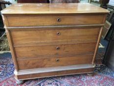 A 19th century Continental walnut commode/chest of four long drawers,