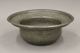 An 18th century Persian engraved silvered copper bowl