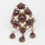 A Renaissance style cabochon, garnet and pearl gilt metal pendant/brooch 7.5 cm high.