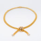 A Van Cleef & Arpels 18 ct gold diamond set necklace Centrally set with floral spray above two
