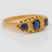 A 9 ct gold diamond and sapphire set ring CONDITION REPORTS: Generally good