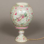 A Chinese porcelain table lamp and shade Worked with courtly and warring figural vignettes,