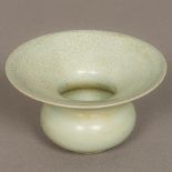 A Chinese Song Dynasty porcelain spittoon With all over celadon glaze. 14 cm diameter.
