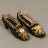 A pair of 19th century lady's heeled shoes Of small proportion, with thread and bead decoration.