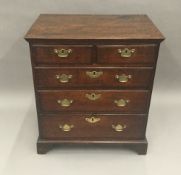 An 18th century oak chest of drawers Of small proportions,