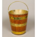 A 19th century brass bound mahogany bucket Of tapering cylindrical form,