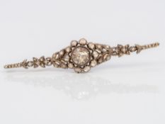 An antique Dutch 14 ct gold and unmarked white metal diamond set bar brooch with oak leaf