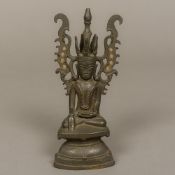 An Eastern bronze model of Buddha Seated in the lotus position with ornate headdress. 20.5 cm high.