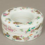 A Chinese porcelain box and cover Of ring form,