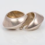 A pair of Georg Jensen sterling silver "cuff" earrings Each 3 cm high.