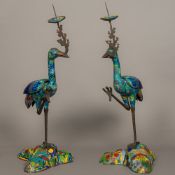 A pair of Chinese brightly decorated pricket stick censers Modelled as cranes standing on brightly