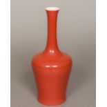 A Chinese porcelain bottle vase With all over red glaze,