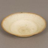 A Chinese Song Dynasty pottery bowl Anhua decorated. 17.5 cm diameter.