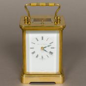 A 20th century brass cased repeating carriage clock by Matthew Norman,