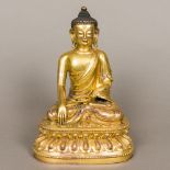 A good and finely cast Chinese gilt bronze figure of Buddha Seated in Dhyanasana,