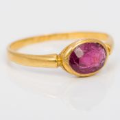 An 18 ct gold almandine garnet set ring,