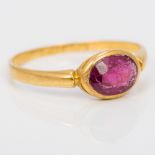 An 18 ct gold almandine garnet set ring,