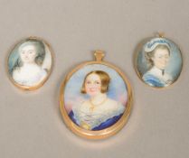 A George III portrait miniature on ivory Depicting a lady wearing a black headdress,