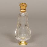 A Dutch gold mounted glass scent bottle Of baluster form, with oak leaf hallmarked. 10.5 cm high.