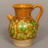 A Chinese Tang Dynasty pottery water dropper With tortoiseshell glaze. 9.5 cm high.