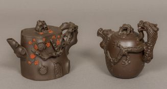 Two Chinese Yixing pottery teapots One faux-bois, the other worked with a dragon, impressed marks.