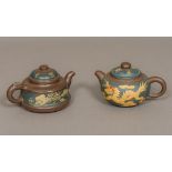 Two Chinese Yixing pottery teapots One decorated with a dragon opposing a phoenix,
