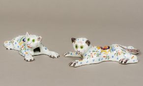 A pair of St Malo faience pottery wall pockets Each formed as a cat with inset glass eyes and each