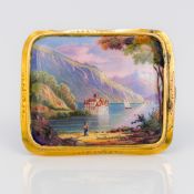 A Swiss unmarked yellow metal framed enamelled brooch Worked with a view of Chillon Castle on Lake