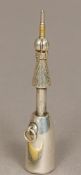 A white metal novelty propelling pencil by Hamilton & Co., Calcutta Modelled as a champagne bottle.