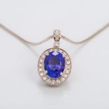 A Chopard 18 ct white gold, diamond and tanzanite pendant Of oval drop form,
